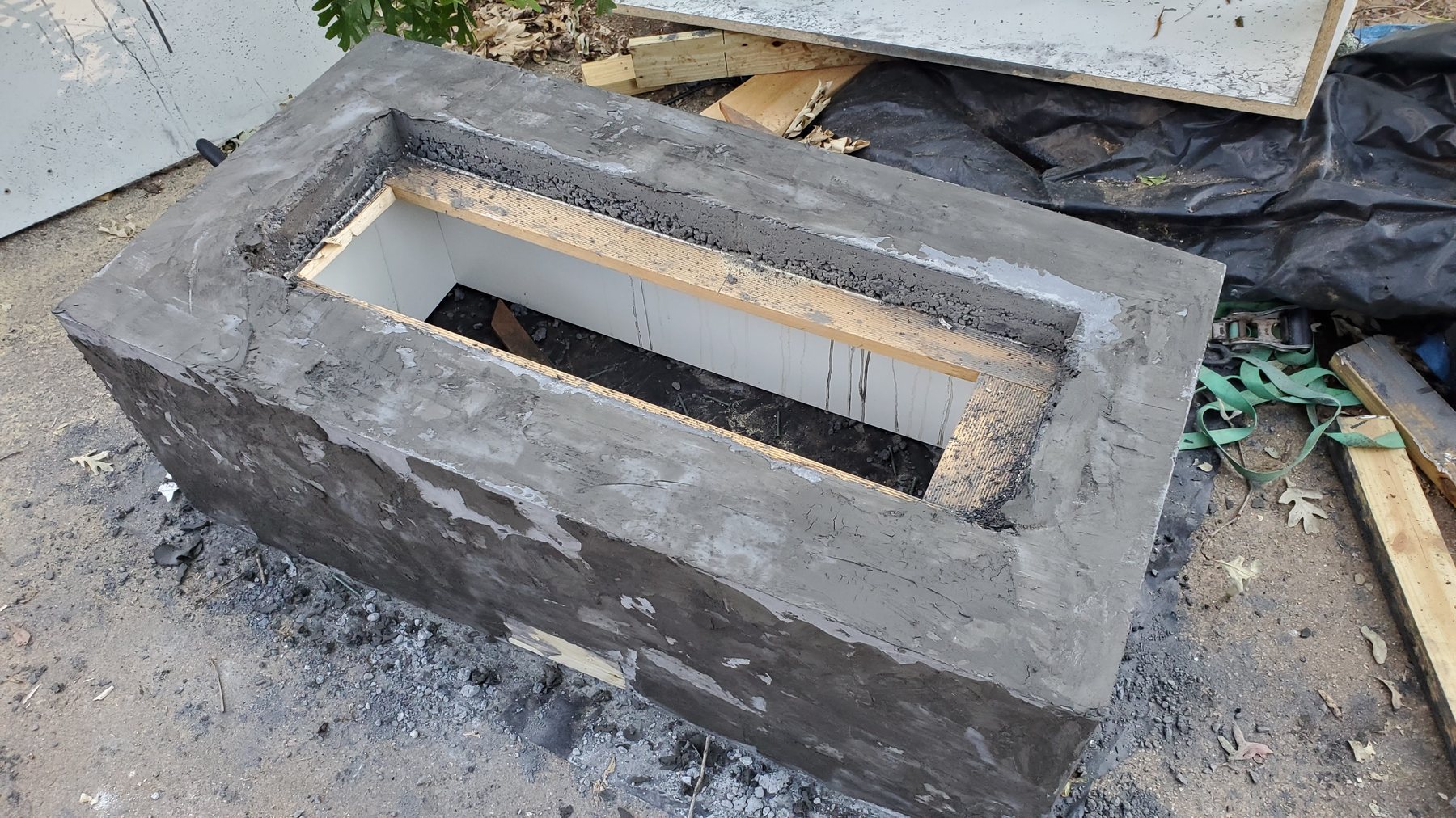 Custom concrete gas fire table after removal from the form